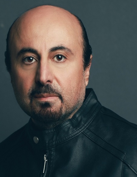 Abdullah wearing a black leather jacket