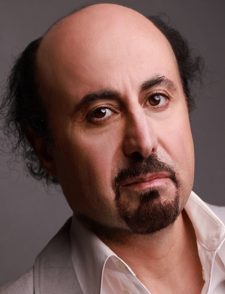 Abdullah displaying a serious look